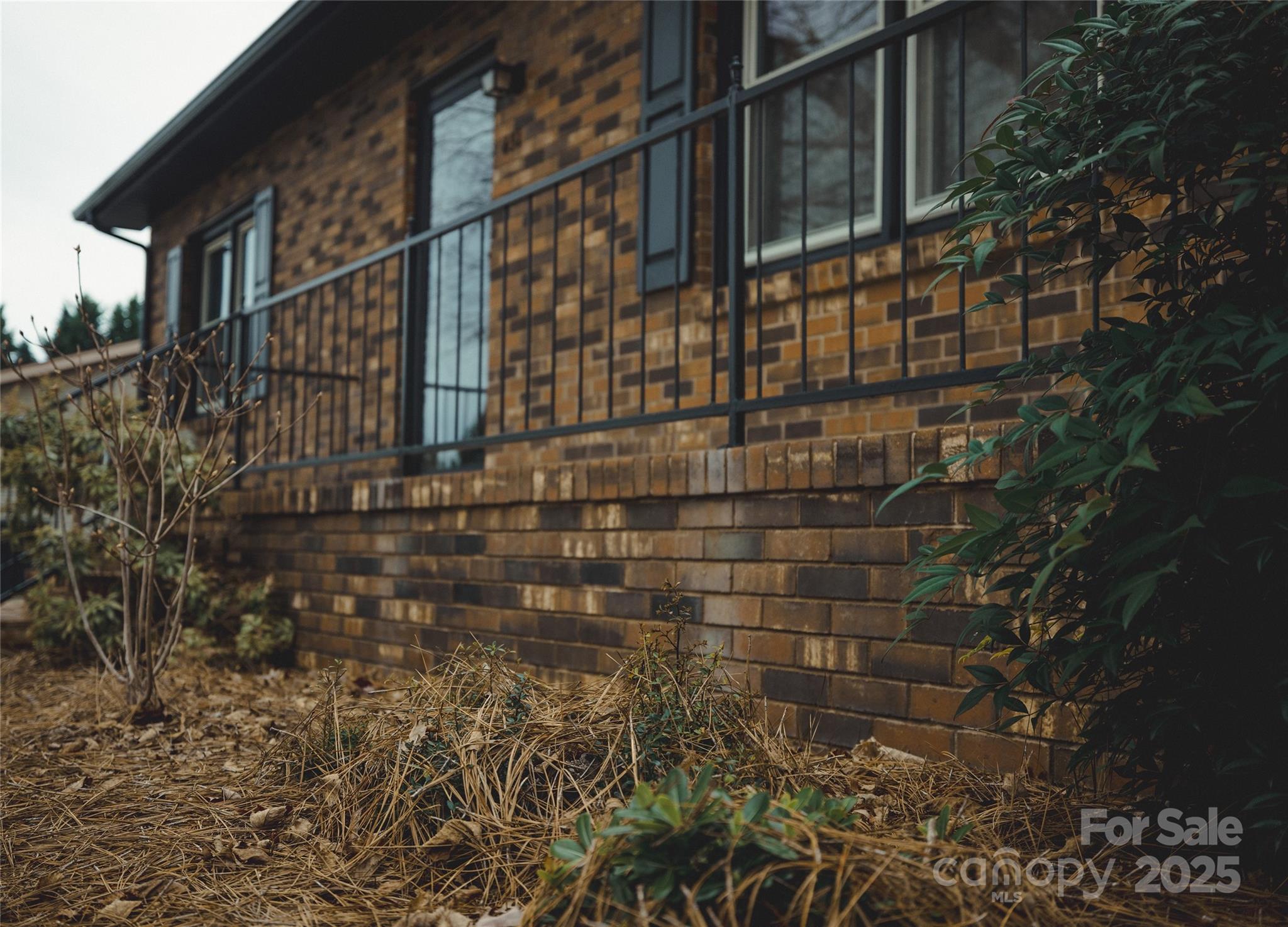 451 James Farm Road Statesville, NC 28625 - Photo 6 of 30 a view of a brick building next to a yard