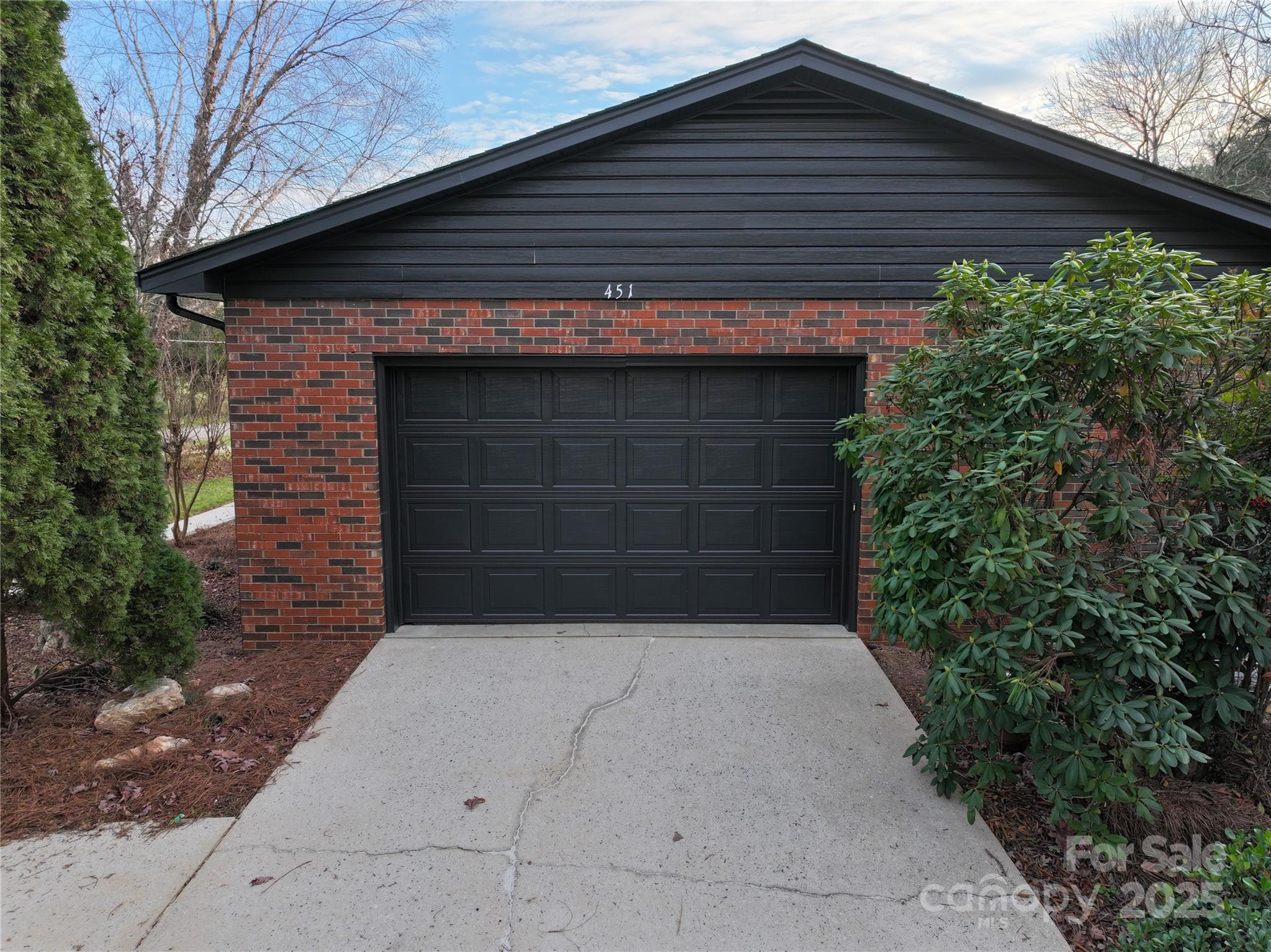 451 James Farm Road Statesville, NC 28625 - Photo 9 of 30 a front view of a house with a garage