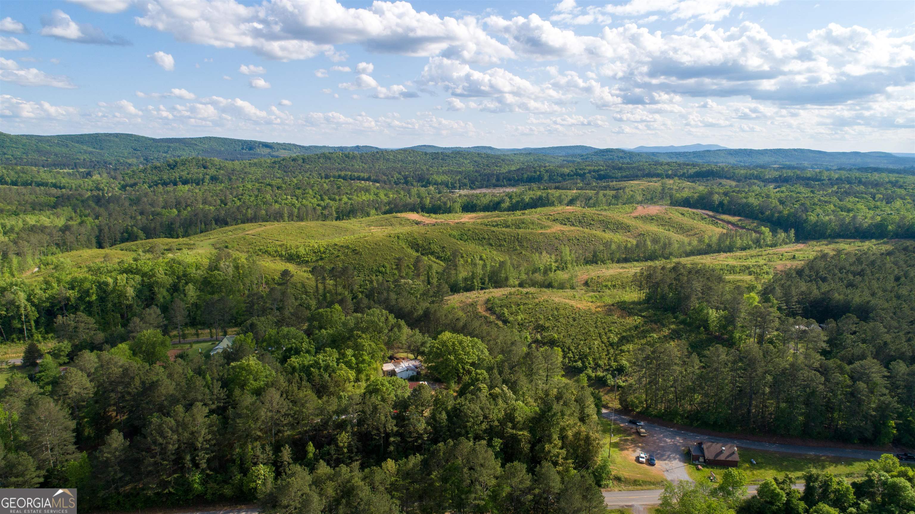 0 Old Blacks Bluff Road Rome, GA 30161 - Photo 11 of 27 a view of a city with lush green forest