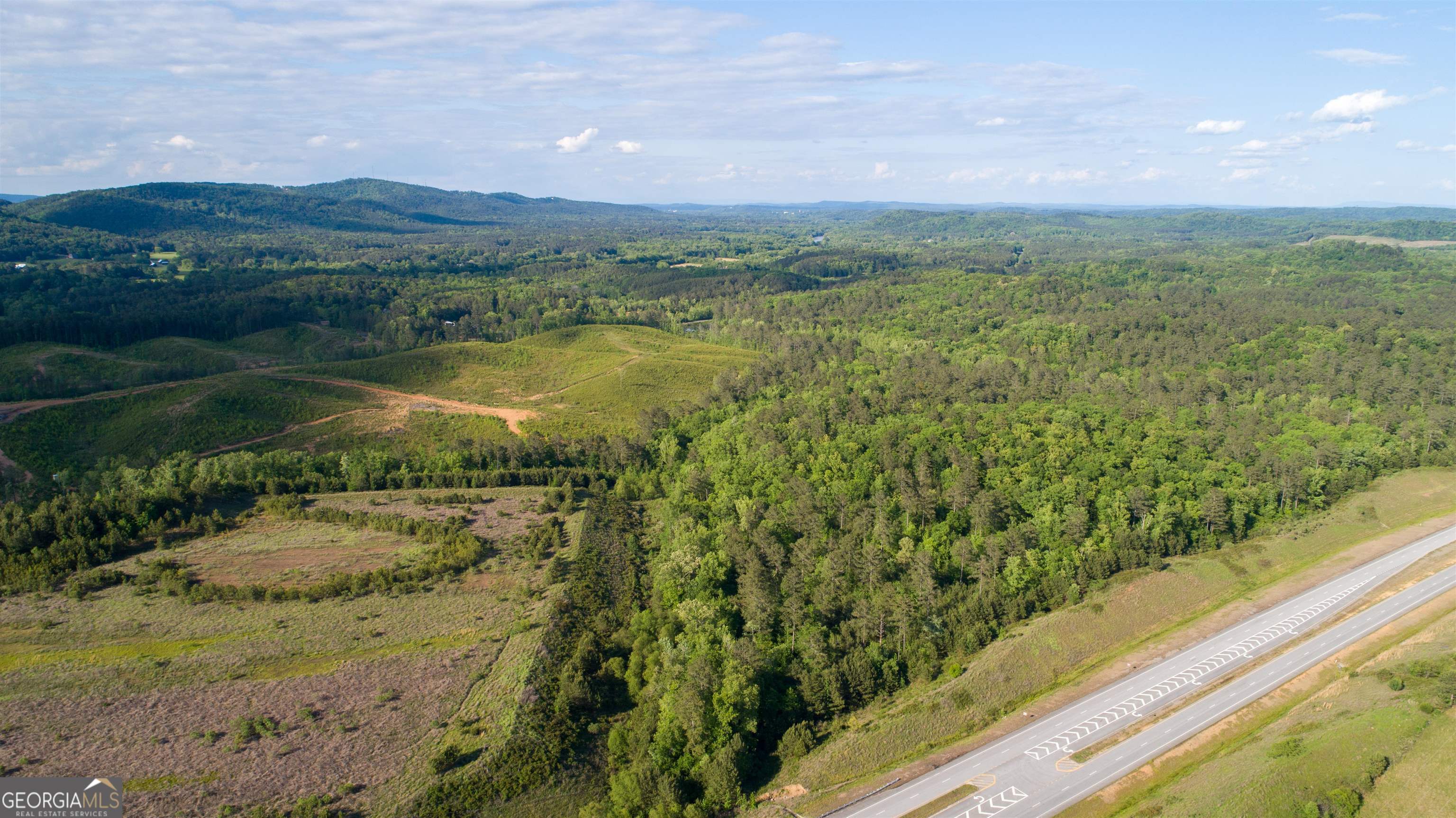 0 Old Blacks Bluff Road Rome, GA 30161 - Photo 26 of 27 a view of a lake with a mountain