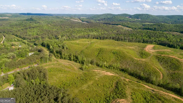 a view of lake with green space