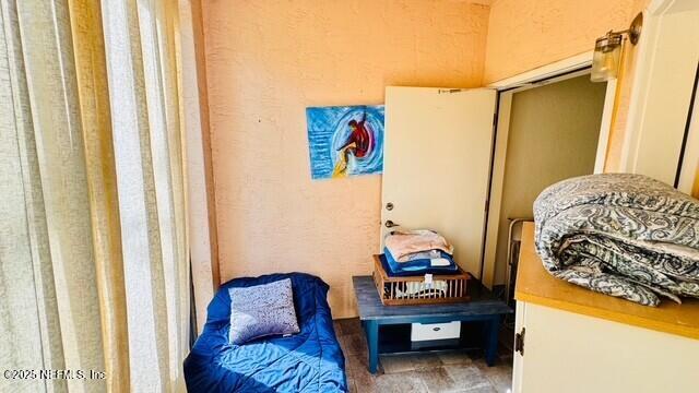 1414 Vista Cove Road St. Augustine, FL 32084 - Photo 15 of 29 a living room with furniture and a window