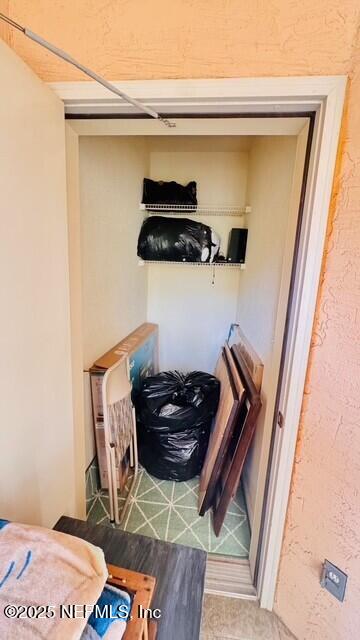 1414 Vista Cove Road St. Augustine, FL 32084 - Photo 16 of 29 a kitchen with a stove and a refrigerator