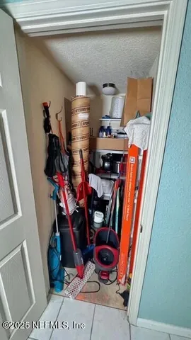 a room with furniture and musical instruments