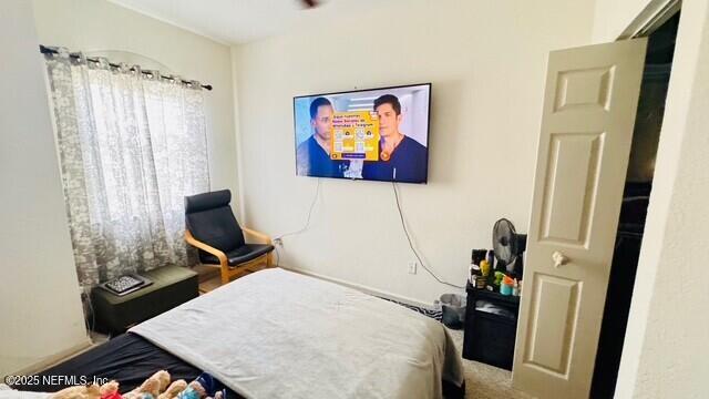 1414 Vista Cove Road St. Augustine, FL 32084 - Photo 25 of 29 a room with furniture and a window