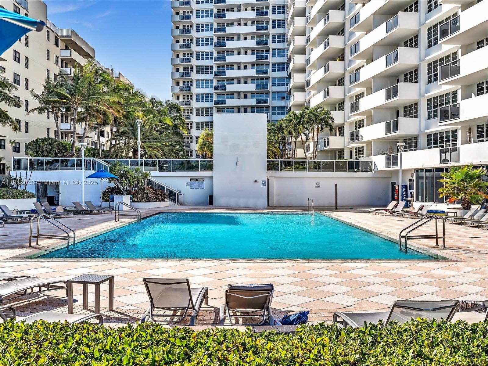 100 Lincoln Road, Unit 710 Miami Beach, FL 33139 - Photo 22 of 36 a front view of a building with garden