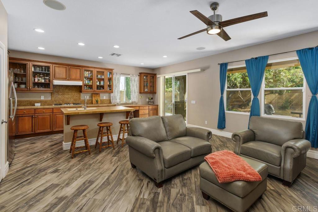 44684 Mumm Street Temecula, CA 92592 - Photo 13 of 51 a living room with furniture and a large window