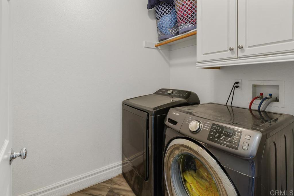 44684 Mumm Street Temecula, CA 92592 - Photo 24 of 51 a utility room with dryer and washer