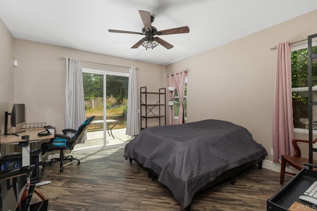 44684 Mumm Street Temecula, CA 92592 - Photo 25 of 51 a bedroom with a bed and a desk