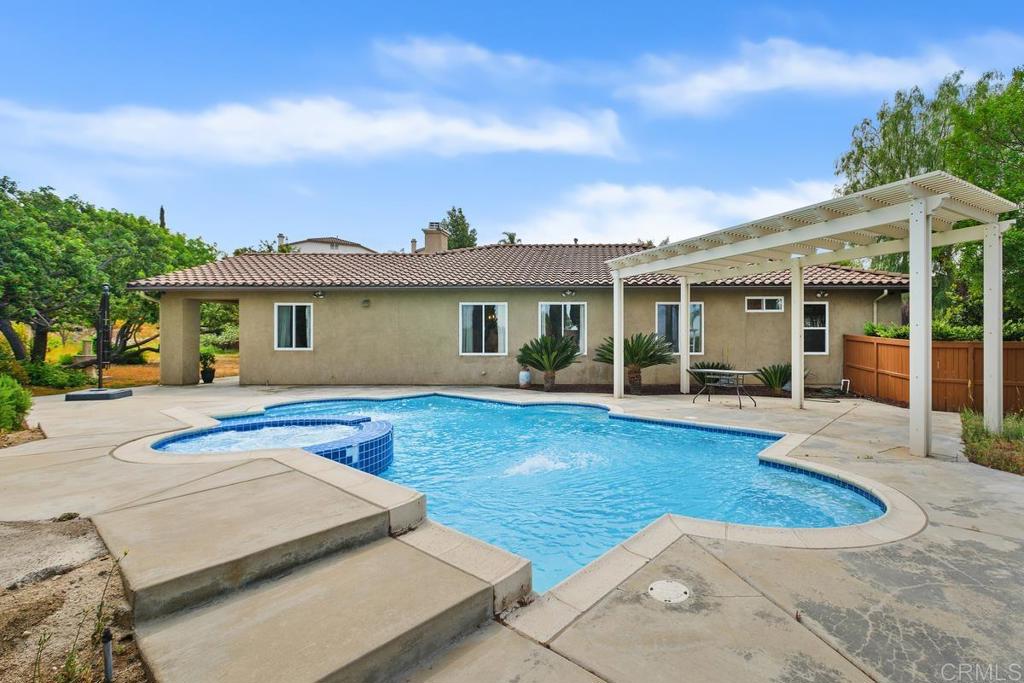 44684 Mumm Street Temecula, CA 92592 - Photo 35 of 51 a view of a house with swimming pool and sitting area