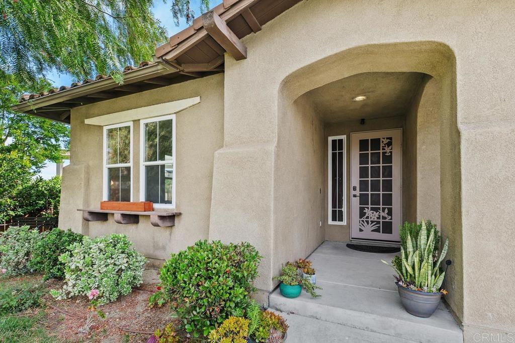 44684 Mumm Street Temecula, CA 92592 - Photo 4 of 51 a front view of a house with a yard