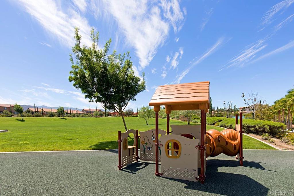 44684 Mumm Street Temecula, CA 92592 - Photo 44 of 51 a view of a porch with furniture and garden