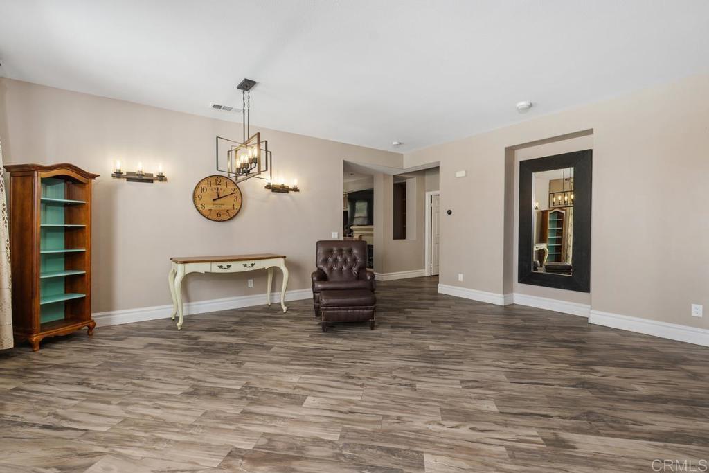 44684 Mumm Street Temecula, CA 92592 - Photo 7 of 51 a living room with furniture and a window