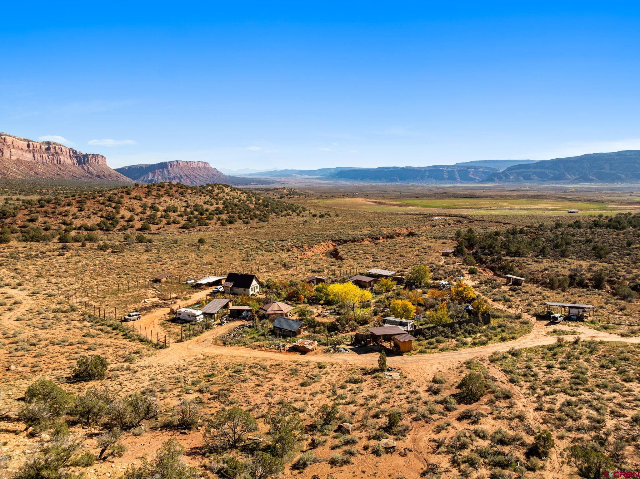 7265 U Road Paradox, CO 81429 - Photo 18 of 21 an aerial view of residential building with trees around