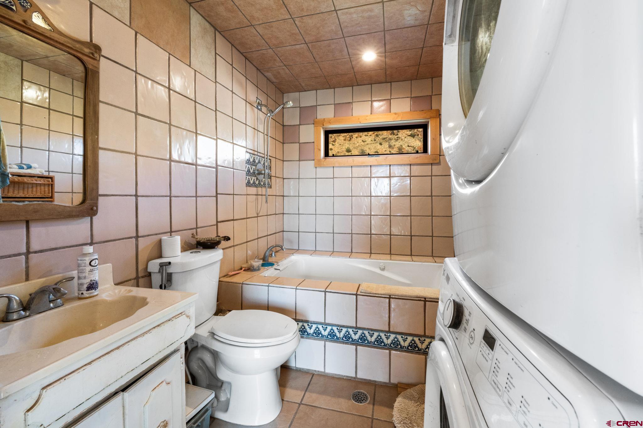 7265 U Road Paradox, CO 81429 - Photo 3 of 21 a bathroom with a sink toilet and shower