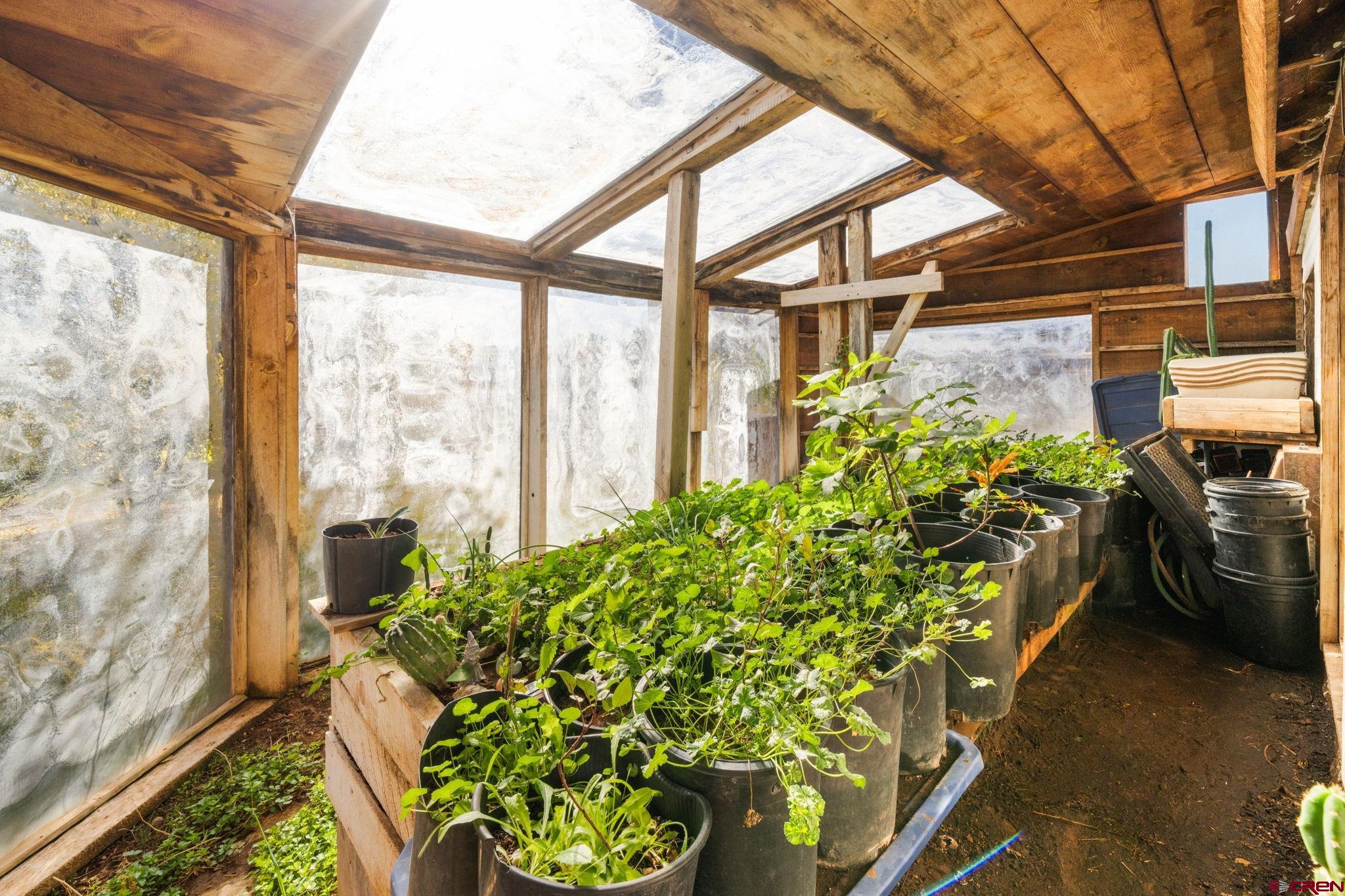 7265 U Road Paradox, CO 81429 - Photo 7 of 21 a front view of a house with a garden