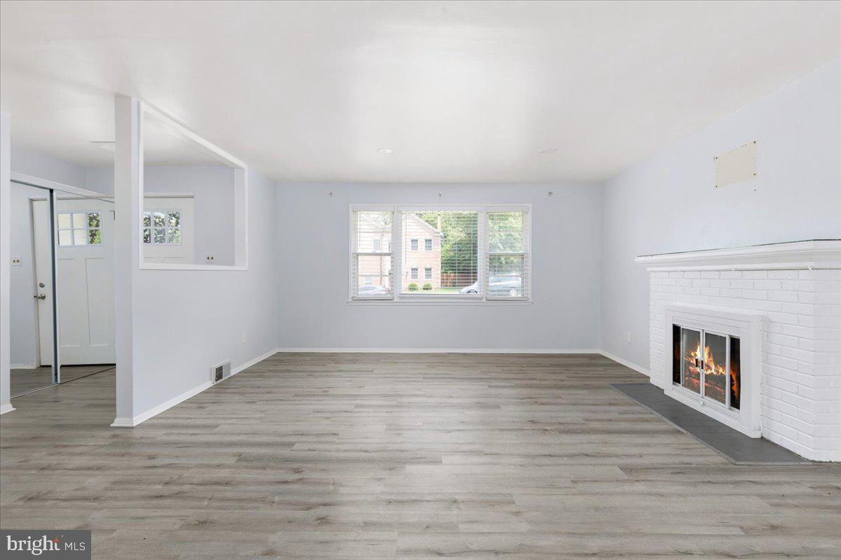 7410 Dickenson Street Springfield, VA 22150 - Photo 6 of 27 Bright and airy living space awaits.