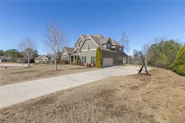 a view of a houses with a road