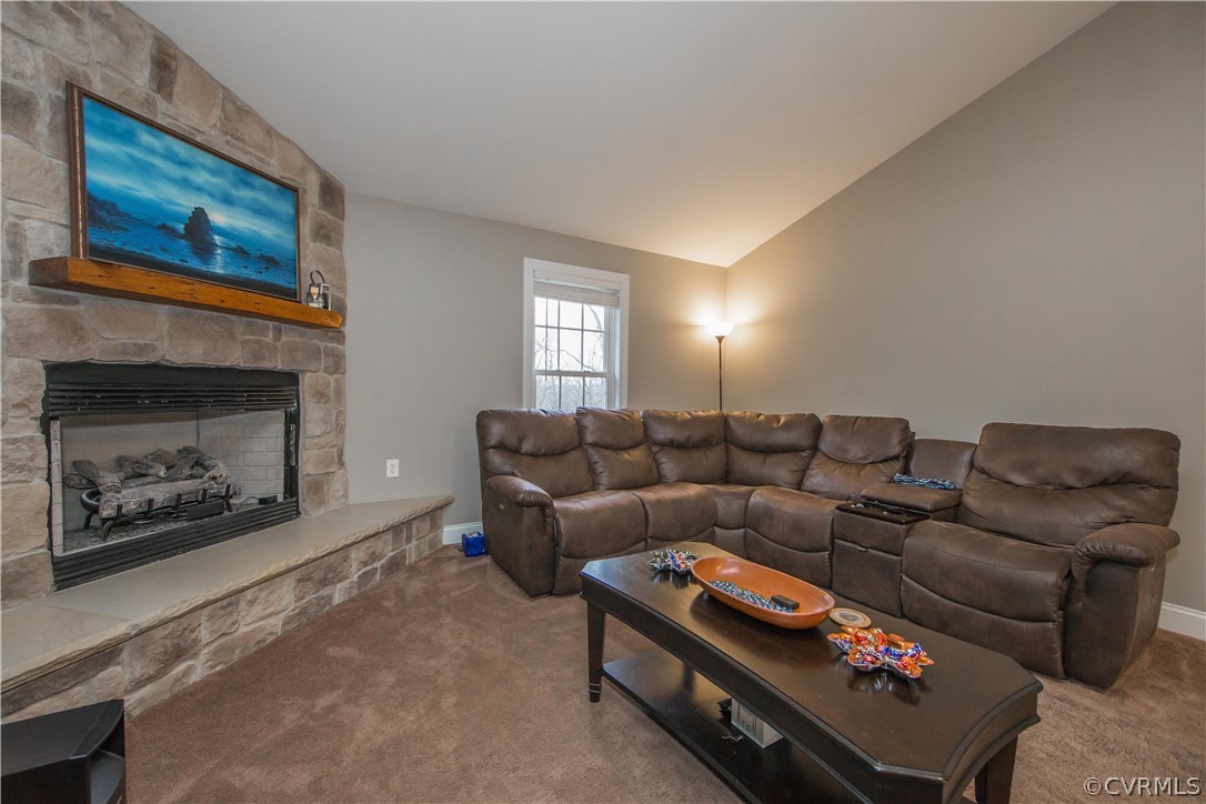 2533 River Run Road Prince George, VA 23875 - Photo 10 of 43 Beautiful stone fireplace and hearth is the focal