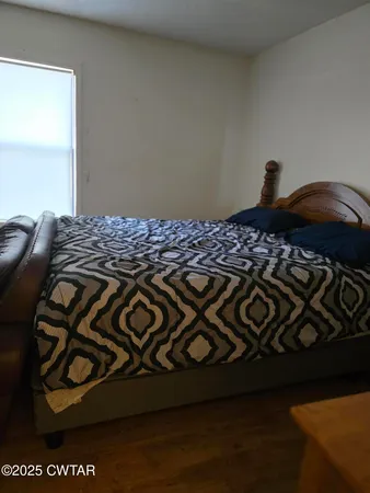 a bedroom with a bed