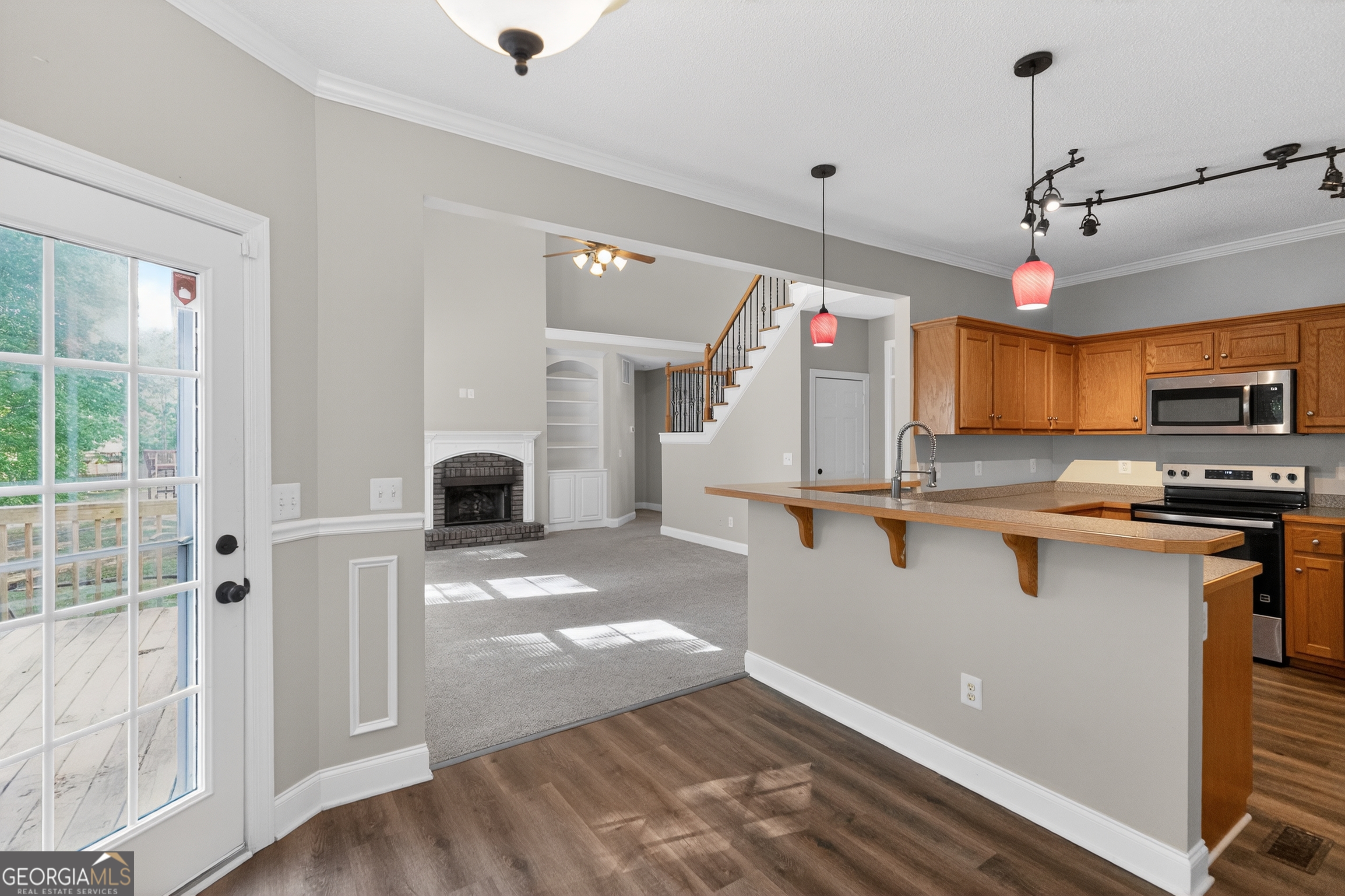 178 Rachel Boulevard Temple, GA 30179 - Photo 20 of 30 a view of a kitchen with a sink wooden floor and windows