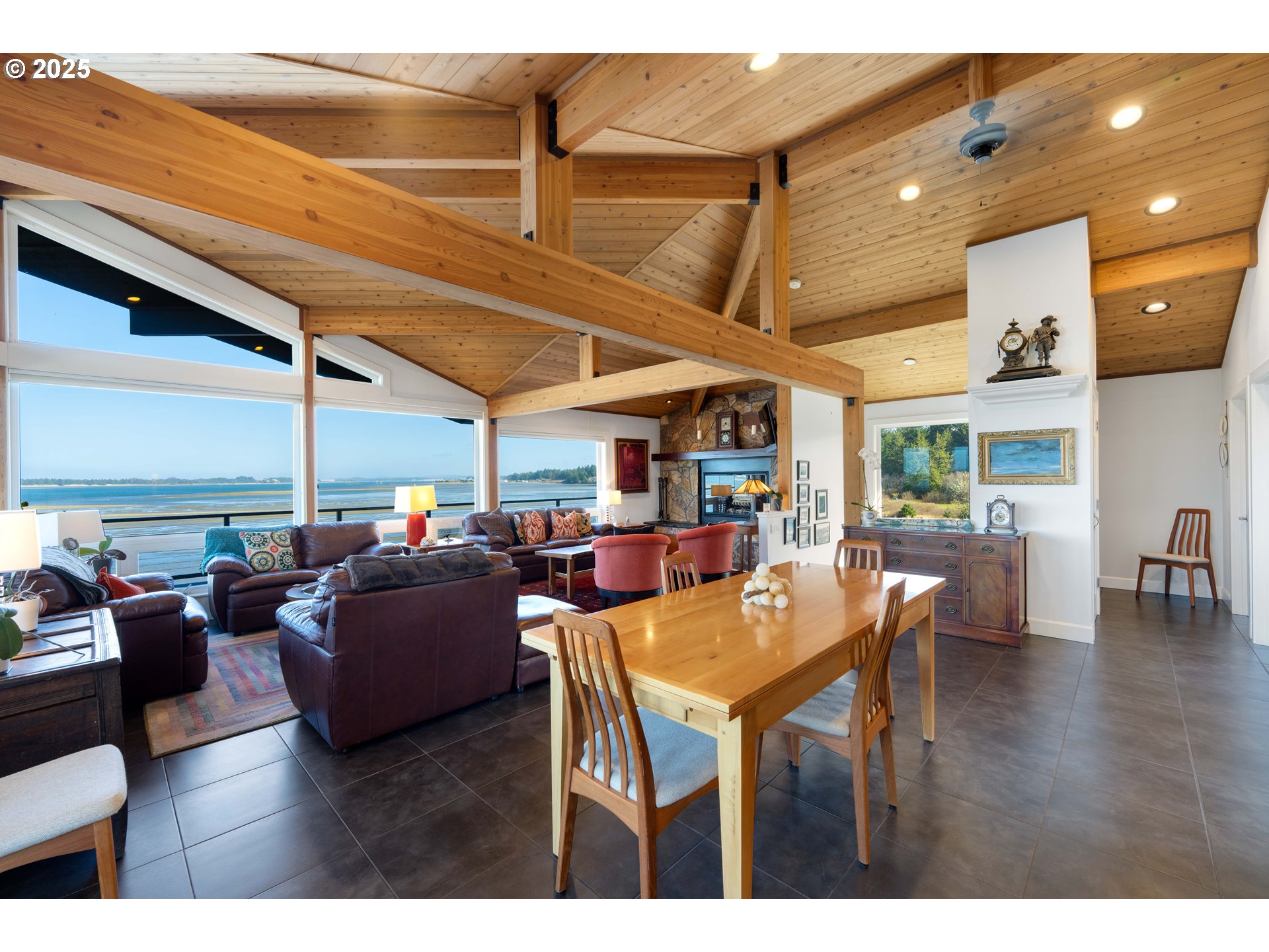 90989 Pigeon Point Loop Coos Bay, OR 97420 - Photo 19 of 48 a view of a dining room with furniture window and outside view
