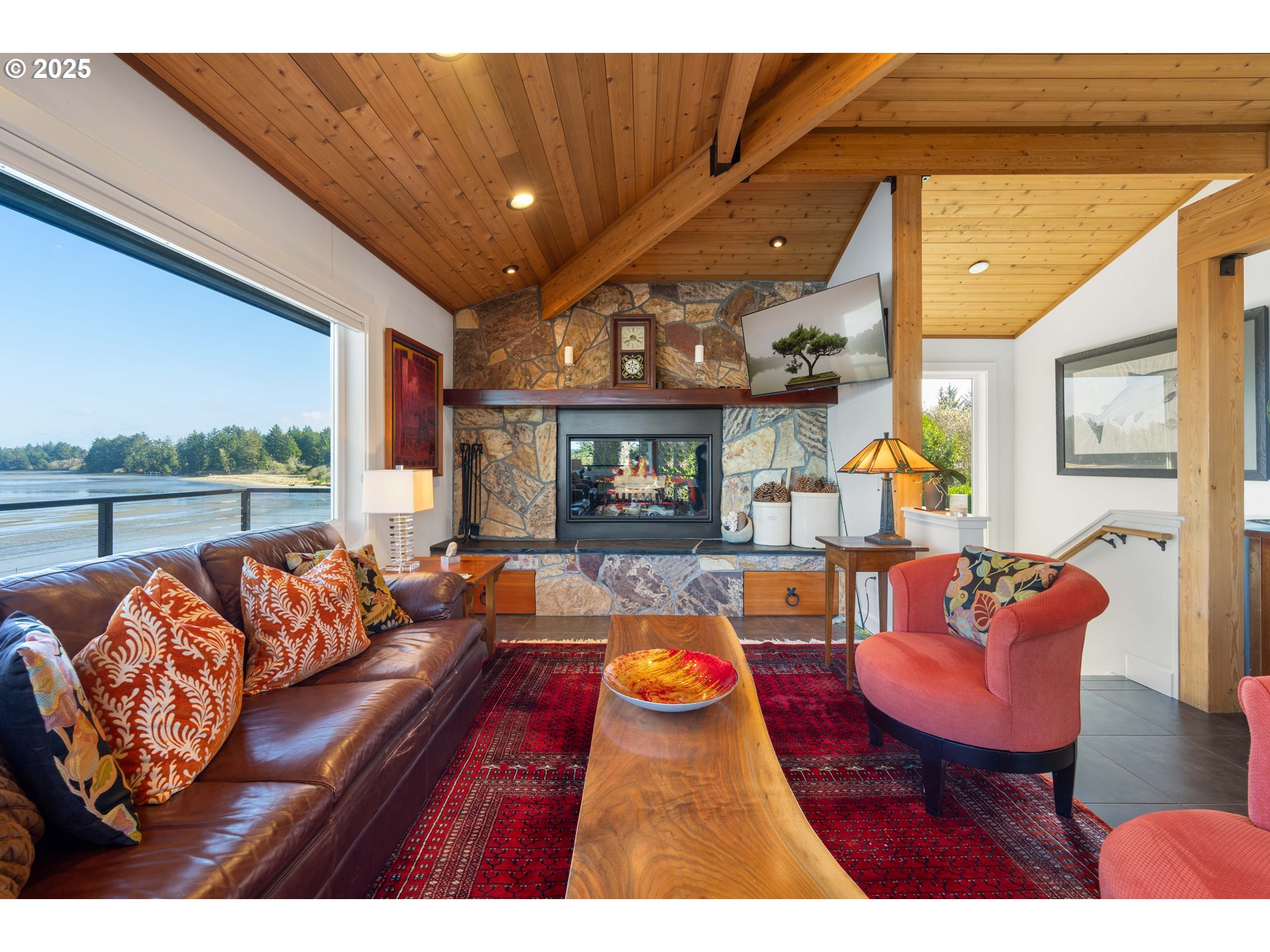 90989 Pigeon Point Loop Coos Bay, OR 97420 - Photo 28 of 48 a balcony with furniture and wooden floor