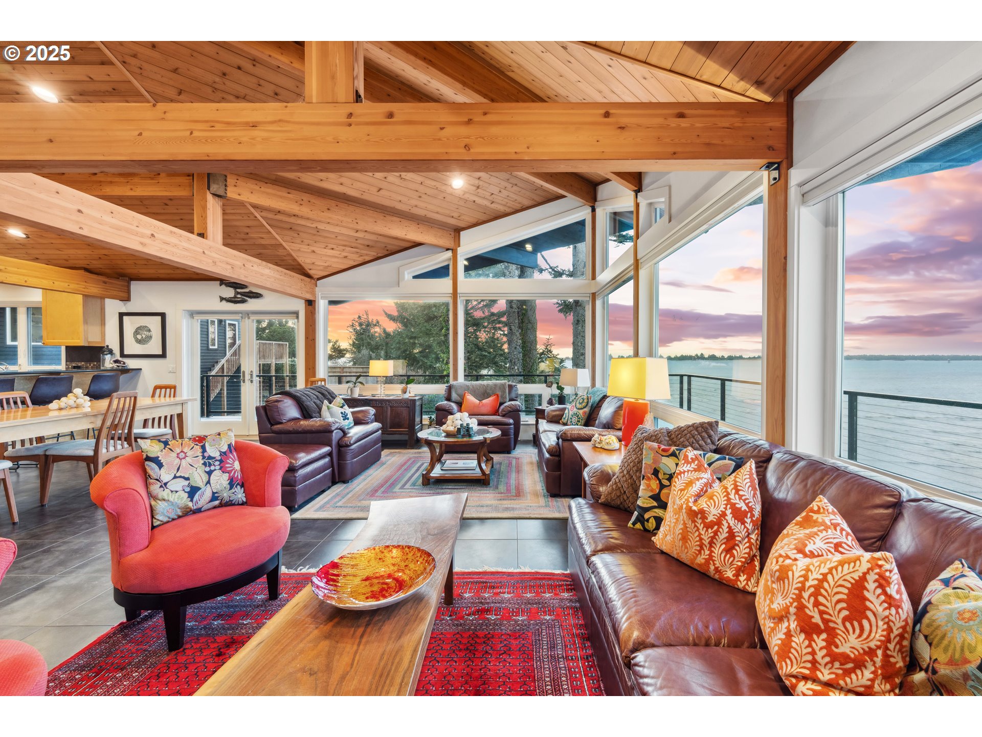 90989 Pigeon Point Loop Coos Bay, OR 97420 - Photo 3 of 48 a living room filled with furniture and a large window