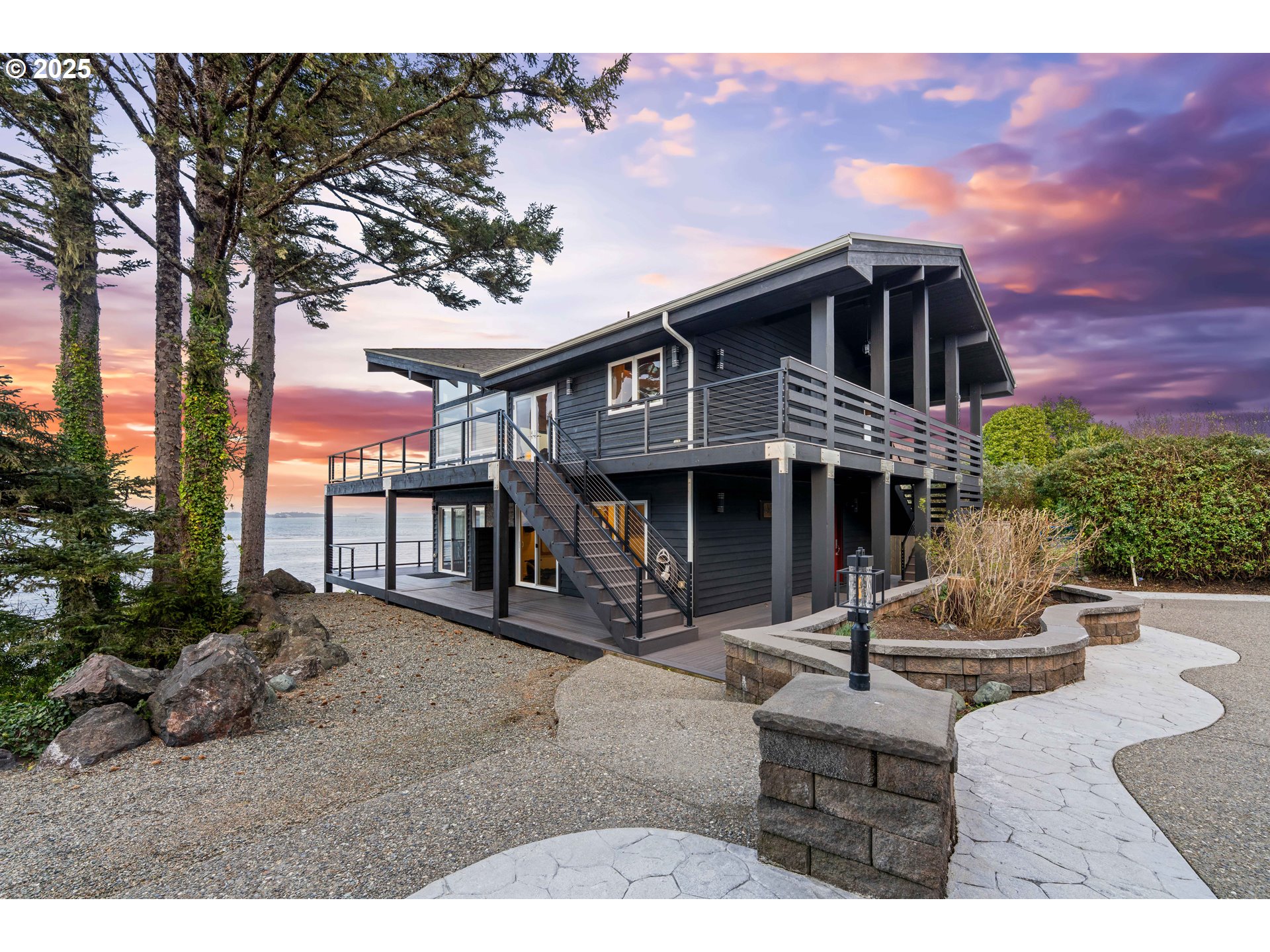 90989 Pigeon Point Loop Coos Bay, OR 97420 - Photo 7 of 48 a house view with a garden space