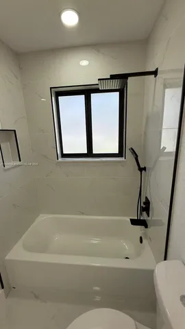a bathroom with a bathtub