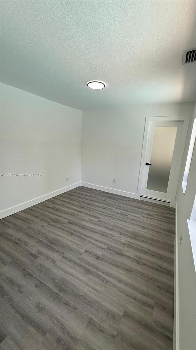 20 Northwest 197th Street Miami Gardens, FL 33169 - Photo 41 of 48 wooden floor in a room