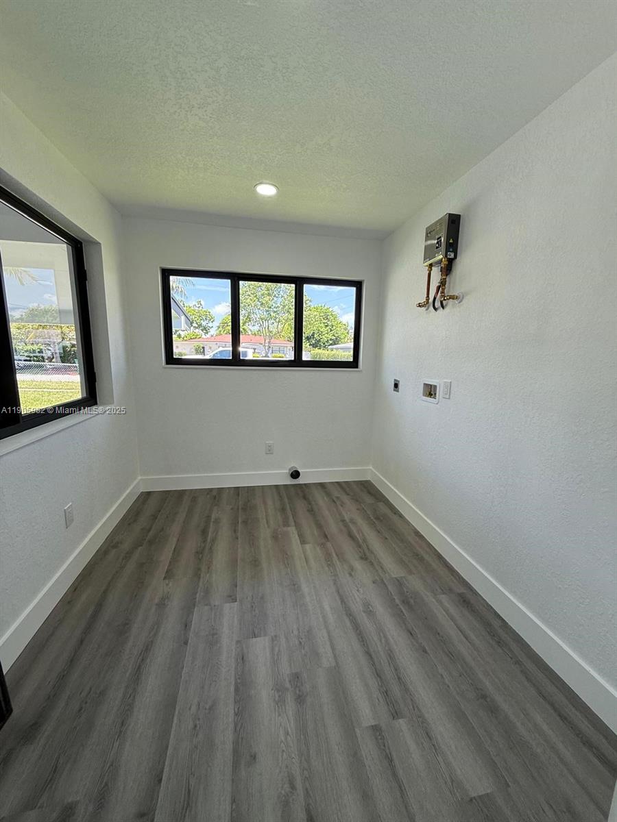 20 Northwest 197th Street Miami Gardens, FL 33169 - Photo 42 of 48 an empty room with a window