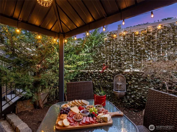 a view of a chairs and tables in the patio