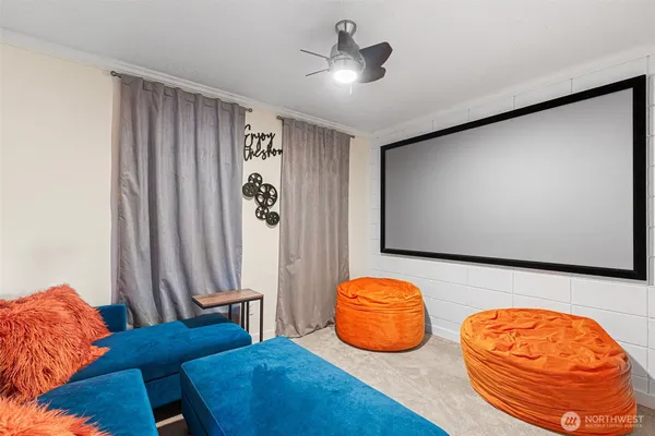 a view of a room with windows and cabinet