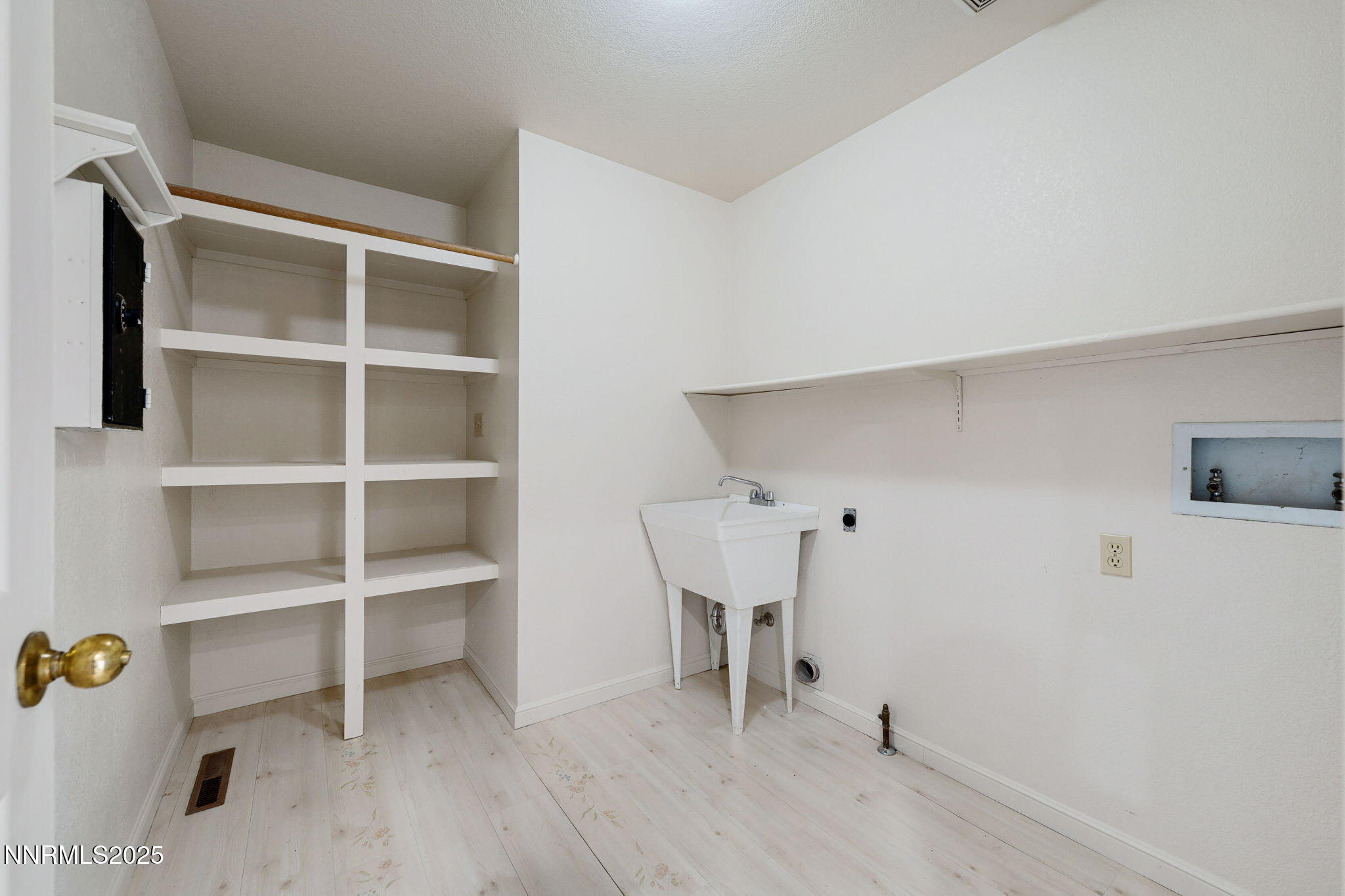 450 Marsh Road Carson City, NV 89701 - Photo 14 of 41 a view of a livingroom with wooden floor and a window