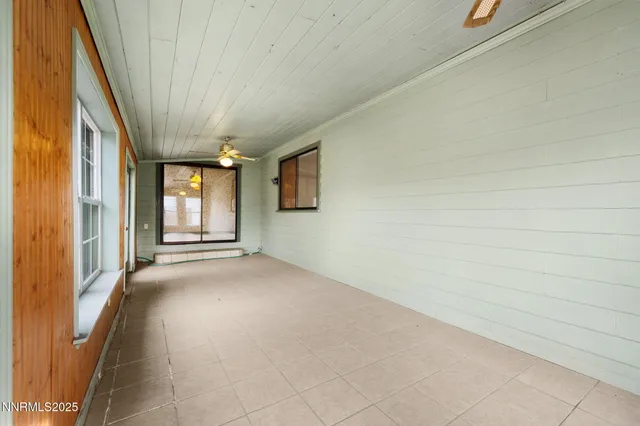 a view of a livingroom with a staircase