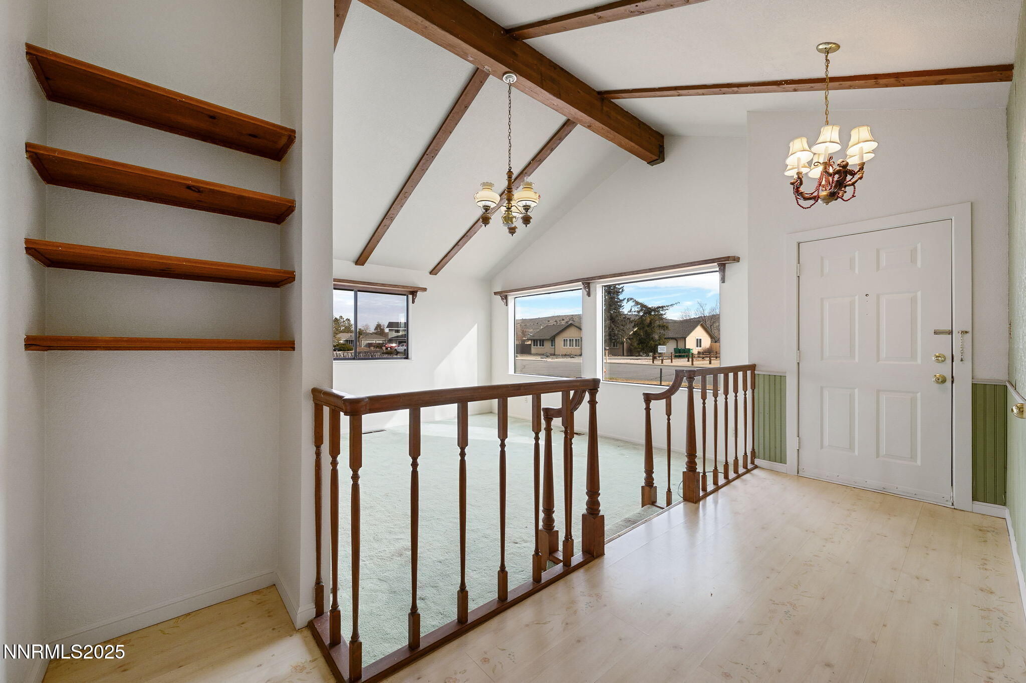 450 Marsh Road Carson City, NV 89701 - Photo 8 of 41 a view of a hallway with a chandelier