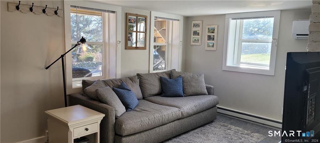 291 High Street Groton, CT 06355 - Photo 13 of 23 Sunny Living Room has blinds