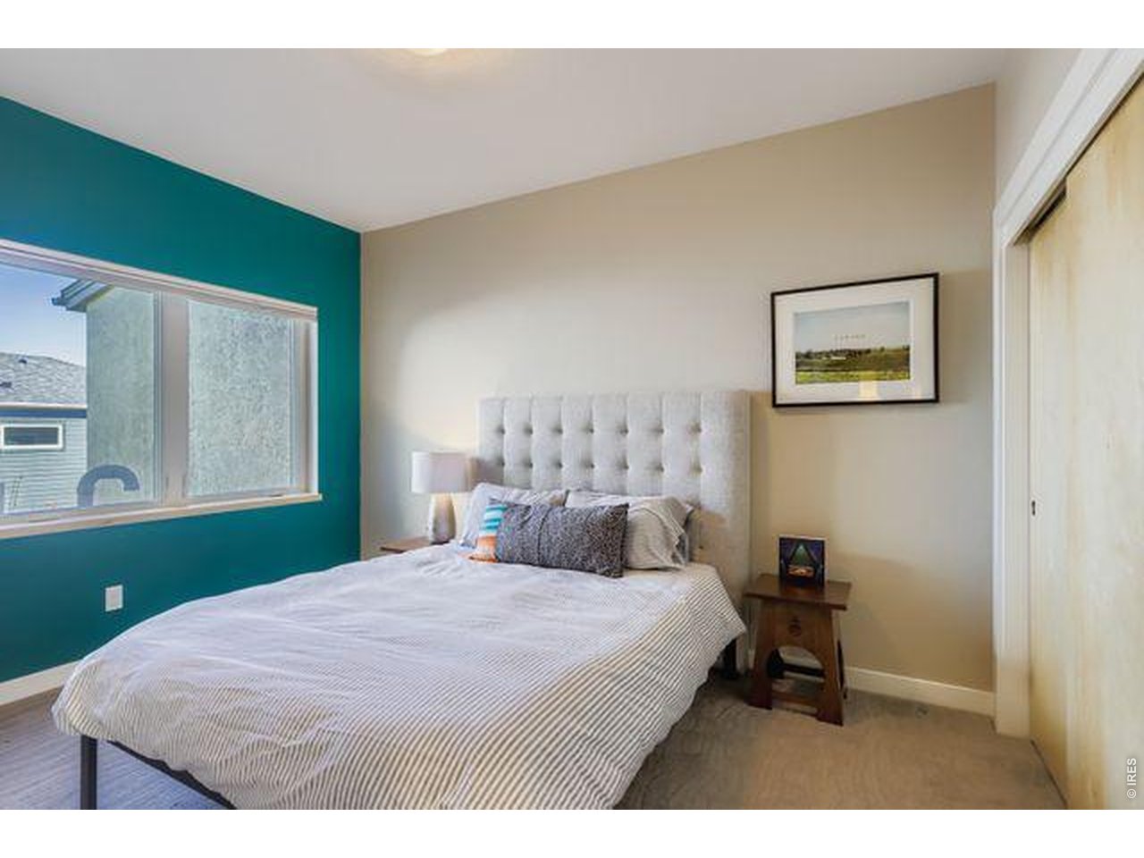 5318 5th Street, Unit D Boulder, CO 80304 - Photo 18 of 30 a bedroom with a bed and a window