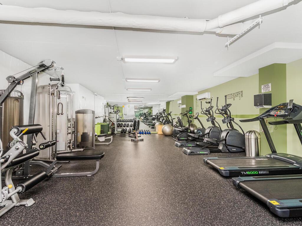 555 Kappock Street, Unit 11B Bronx, NY 10463 - Photo 25 of 29 a view of a room with gym equipment