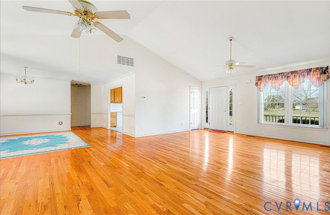 5025 Hurop Road Sandston, VA 23150 - Photo 11 of 57 a view of empty room with window and wooden floor