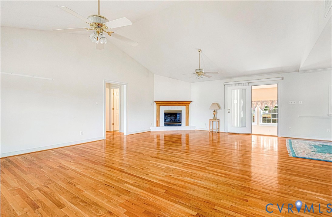 5025 Hurop Road Sandston, VA 23150 - Photo 13 of 57 a view of an empty room with window and wooden floor