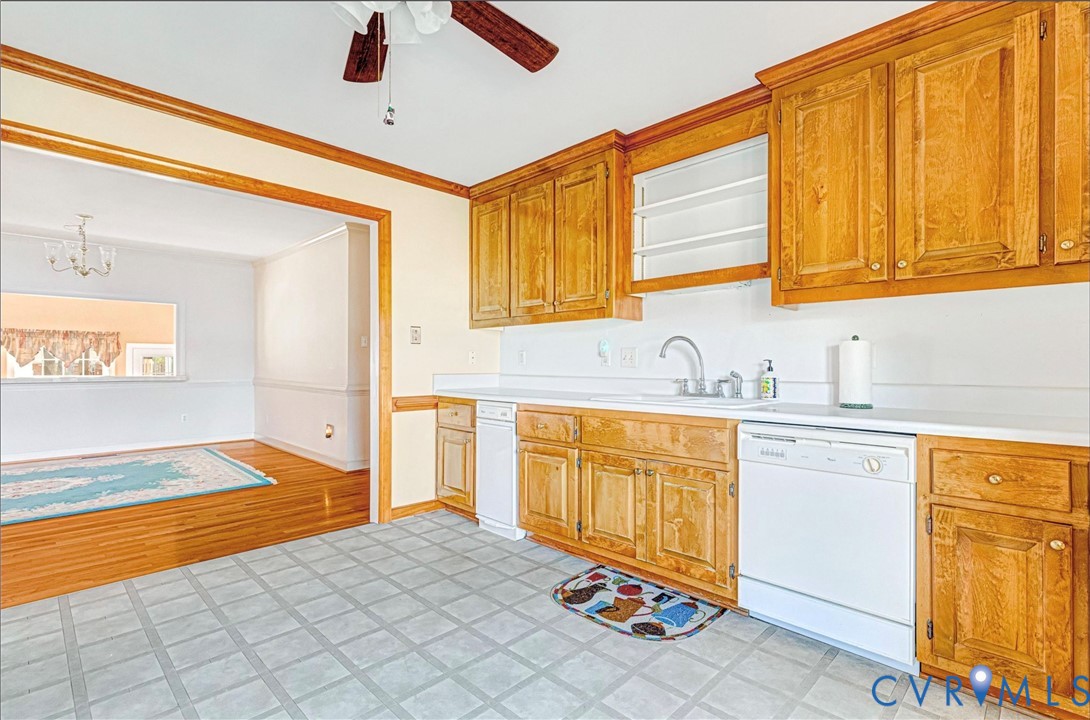 5025 Hurop Road Sandston, VA 23150 - Photo 19 of 57 a bedroom with a bed dresser and a cabinets