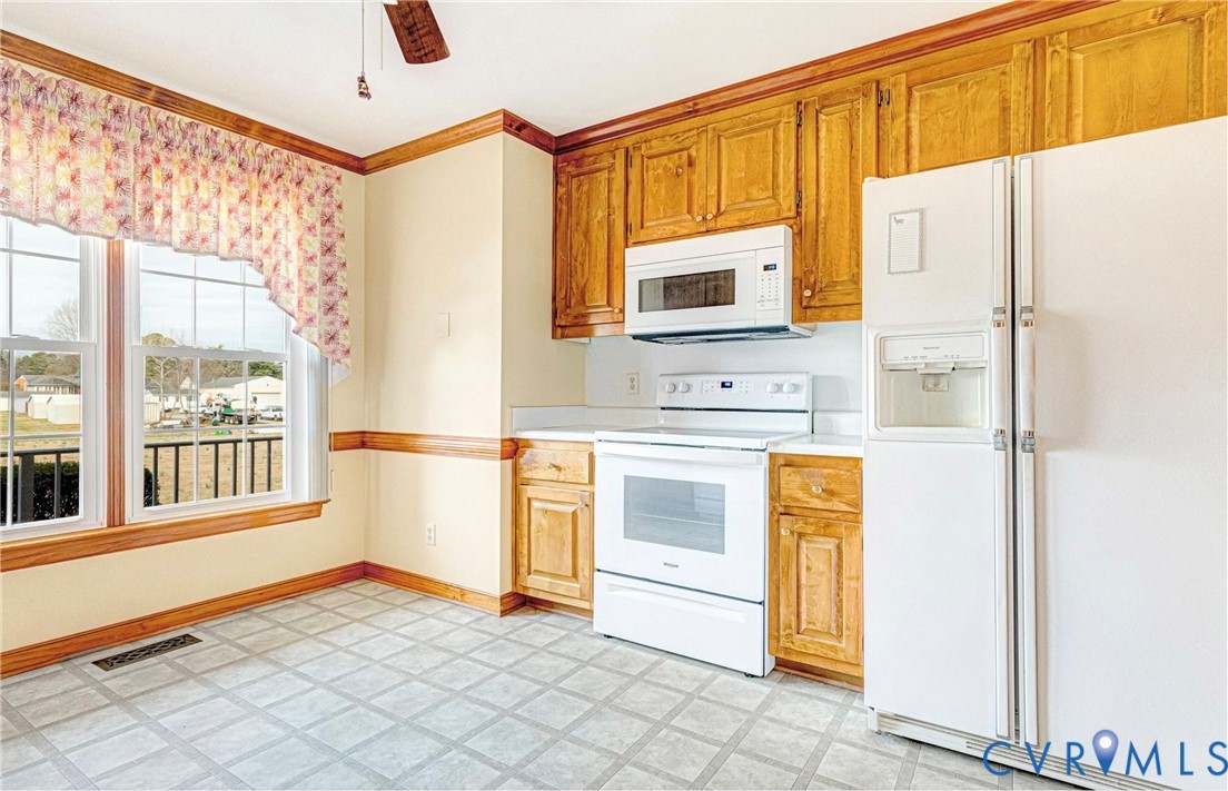 5025 Hurop Road Sandston, VA 23150 - Photo 20 of 57 a kitchen with stainless steel appliances a refrigerator and a stove