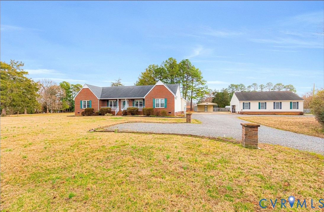 5025 Hurop Road Sandston, VA 23150 - Photo 2 of 57 a house view with a swimming pool