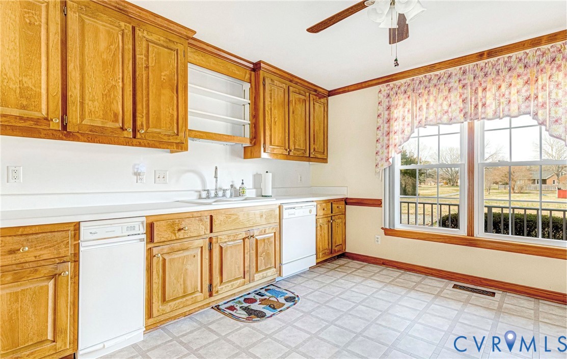 5025 Hurop Road Sandston, VA 23150 - Photo 21 of 57 a spacious bathroom with a granite countertop sink and a large mirror