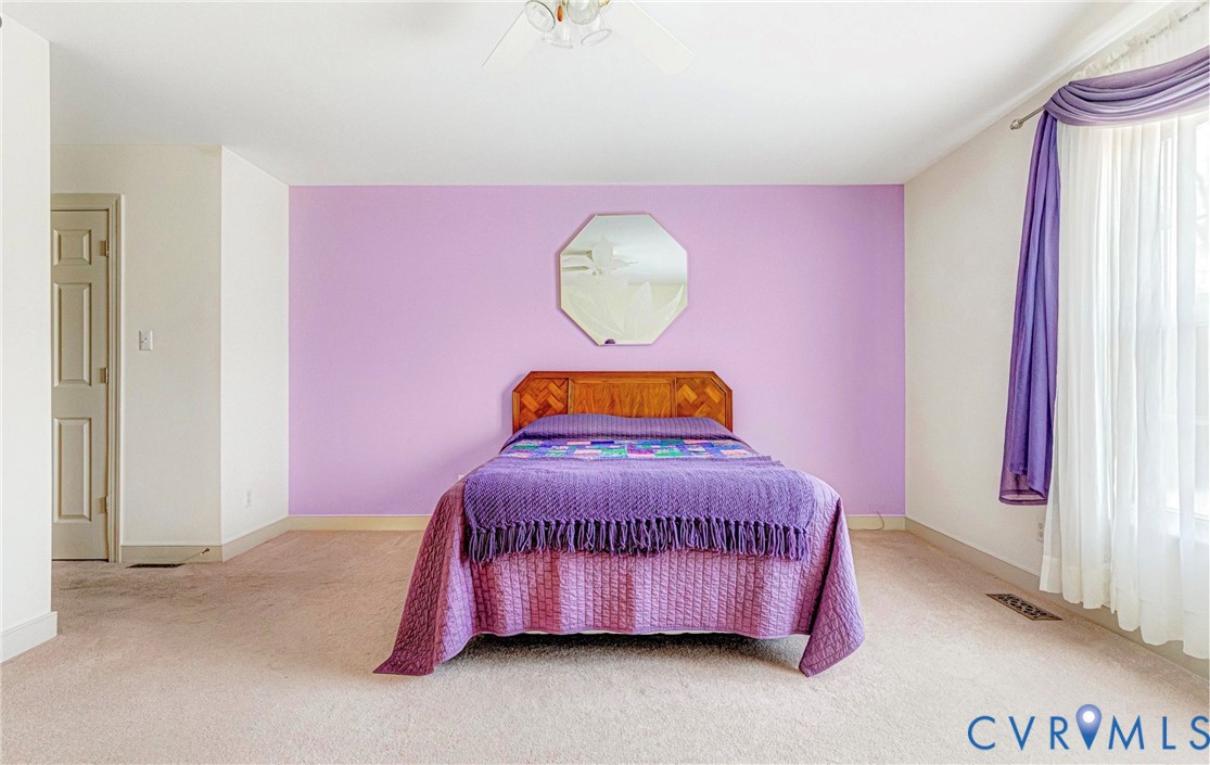 5025 Hurop Road Sandston, VA 23150 - Photo 27 of 57 a bedroom with a bed and a window