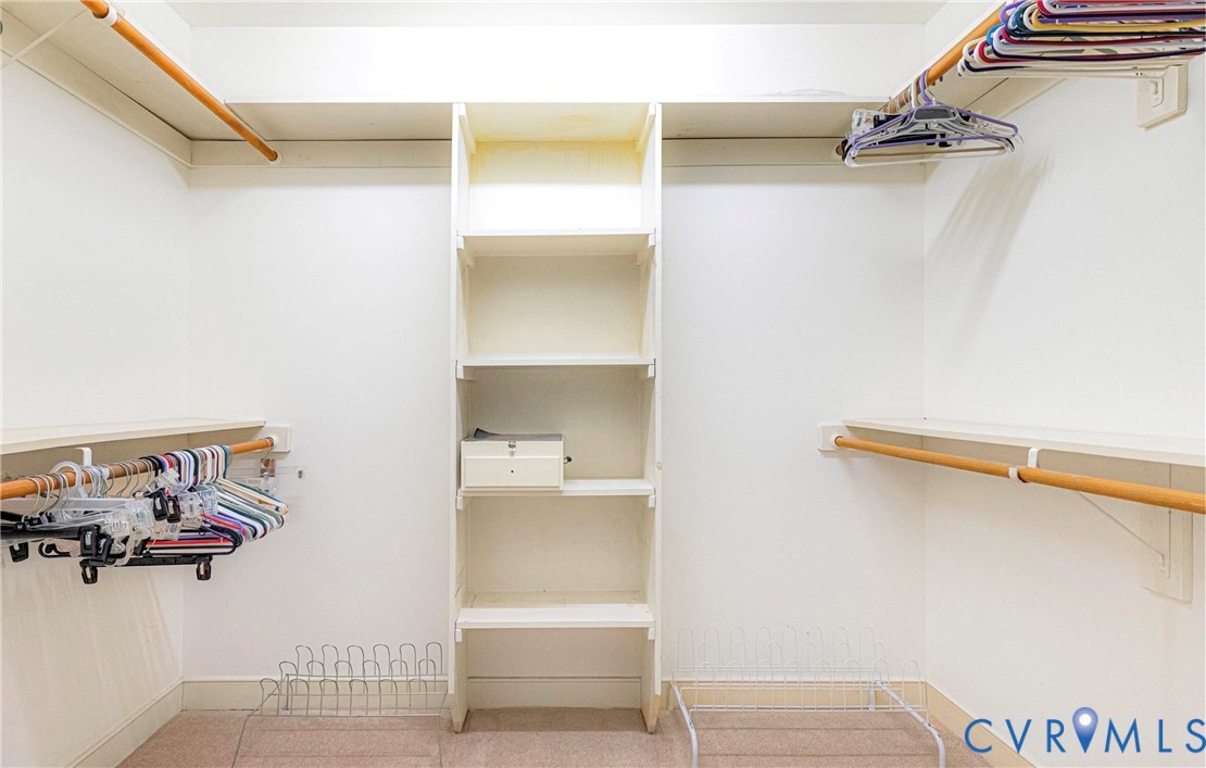 5025 Hurop Road Sandston, VA 23150 - Photo 30 of 57 a view of walk in closet with clothes and shoes