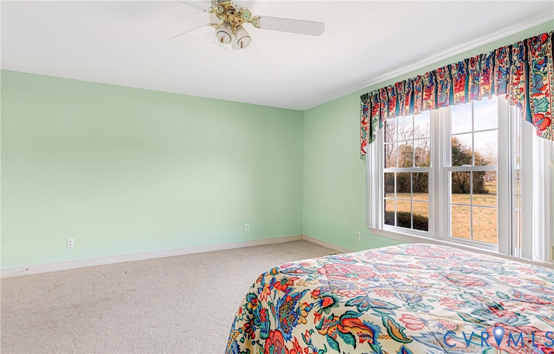 5025 Hurop Road Sandston, VA 23150 - Photo 36 of 57 a bedroom with a bed and a window