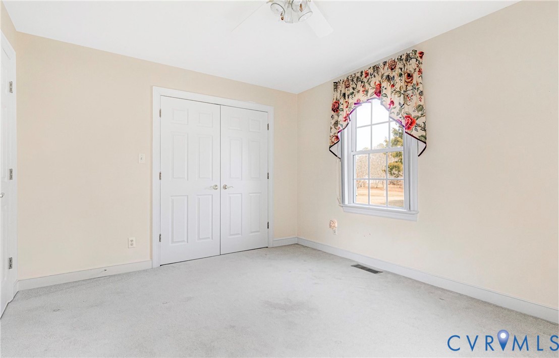 5025 Hurop Road Sandston, VA 23150 - Photo 39 of 57 an empty room with windows
